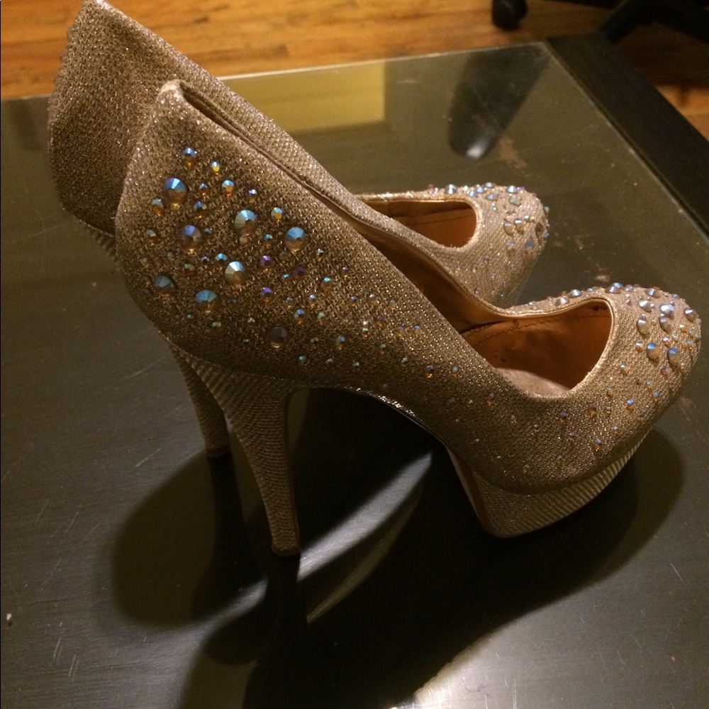 Gold studded platform shoes